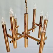 Geometric brass chandelier, Hollywood Regency, design by G. Sciolari, 1970.