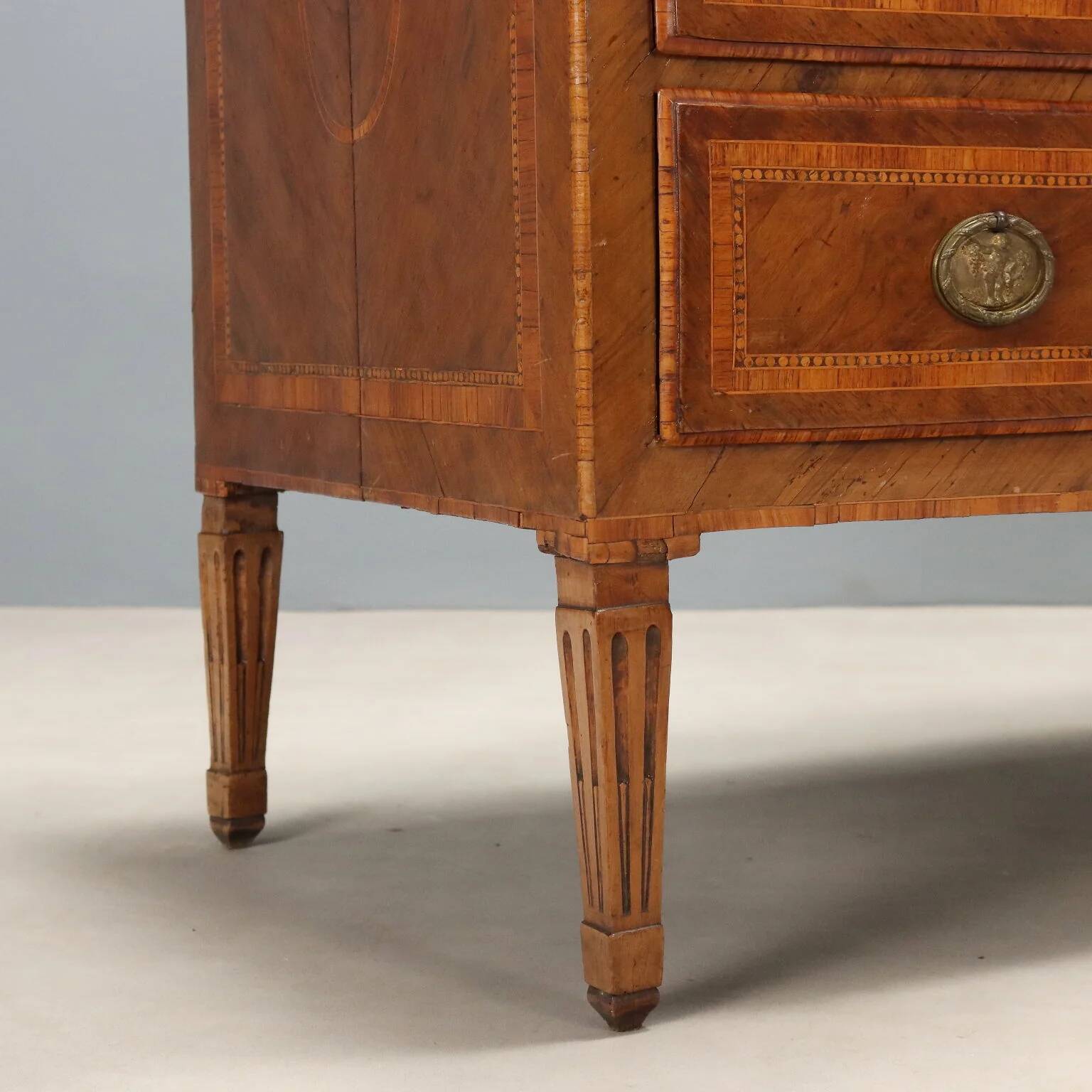 Antique neoclassical walnut commode from the 18th century.