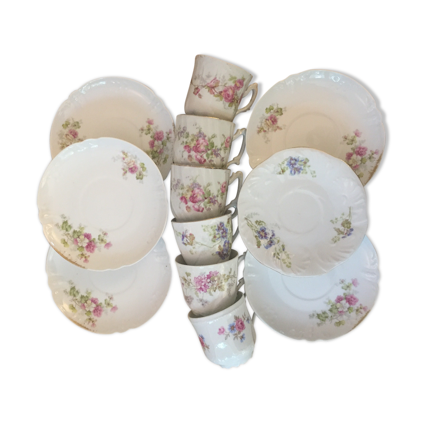 6 antique cups and mismatched saucers