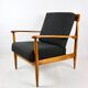 Black boucle chair, Danish design on the cushions, 1970s.