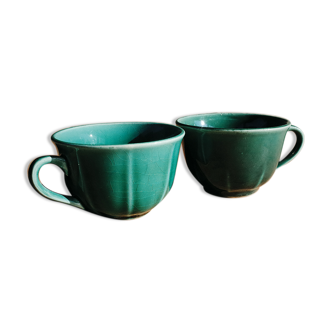 Duo of emerald green coffee cups