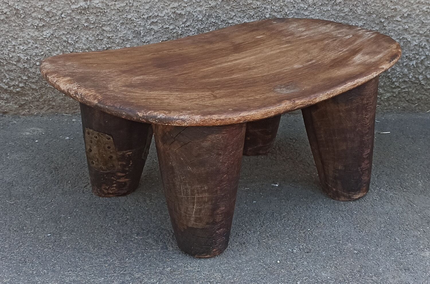 Antique wooden stool. Senufo African art from Côte d'Ivoire.