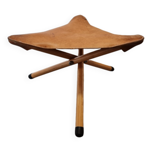 tabouret tripode en cuir