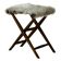 Folding stool, reupholstered in long-haired sheepskin, mid-century modern style, 1950s.