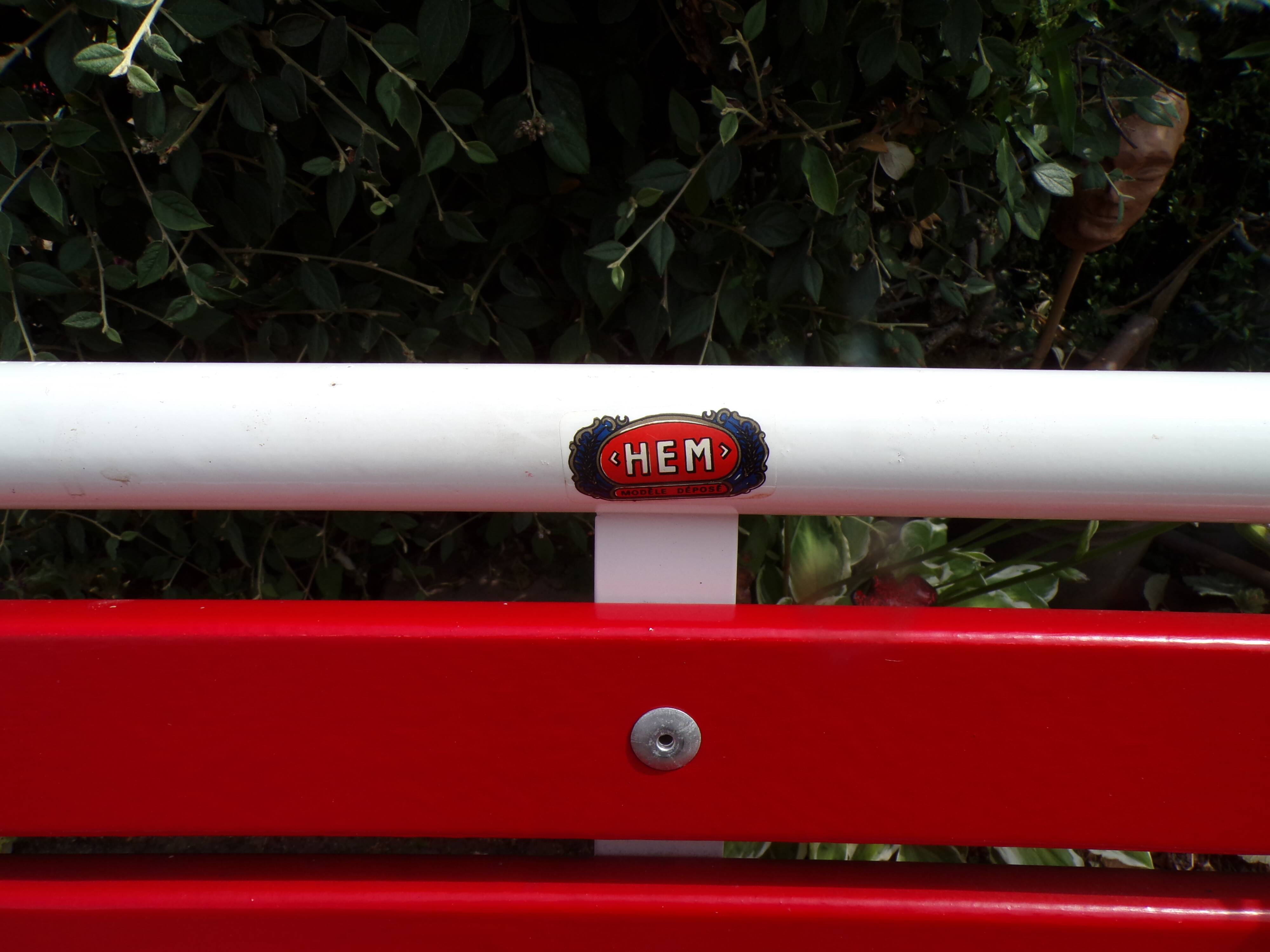 Old folding wooden and metal bench