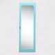 Beveled mirror on turquoise Parisian door