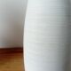 White ceramic vase with fine streaks