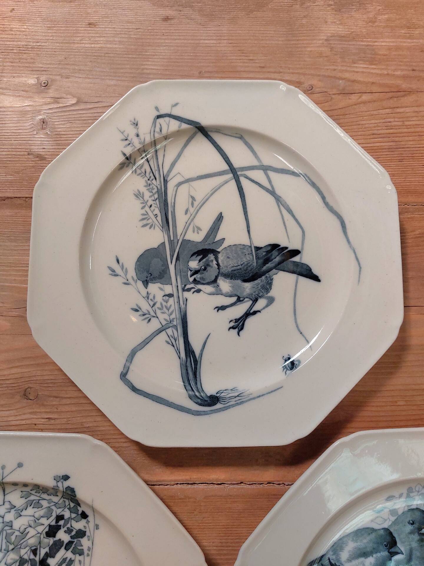 Set of three blue ironstone flat plates.