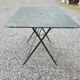 Old folding iron garden table