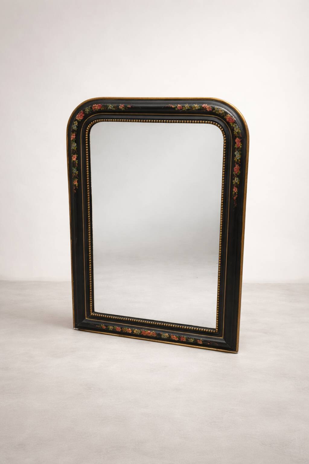 Antique Napoleon III mirror, black frame with hand-painted floral decoration – 19th century