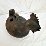 Pourer, terracotta teapot. Hen.