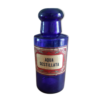 Blue glass pharmacy bottles