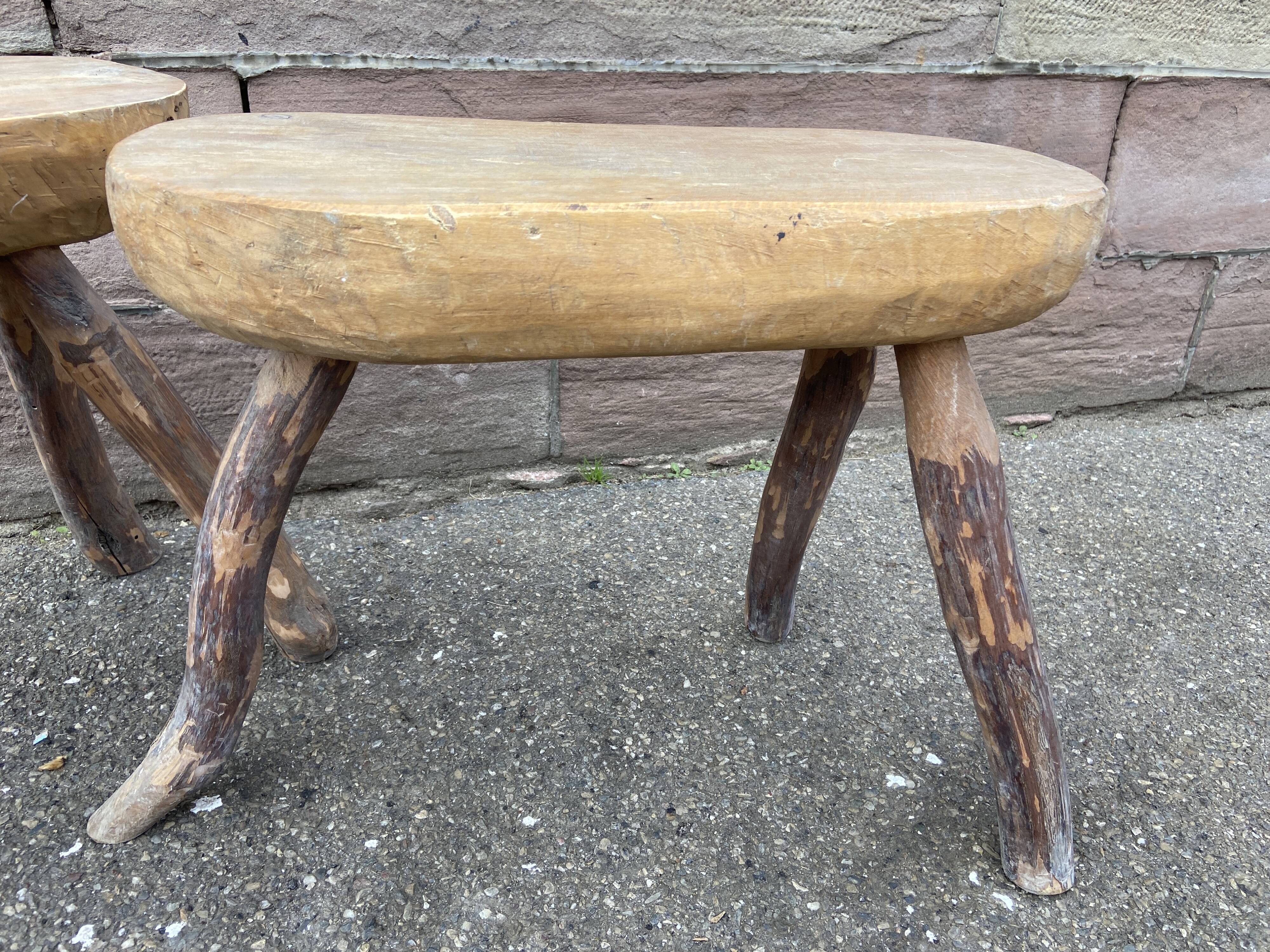 Pair of rustic 1940 brutalist wooden tripod farm stools vintage