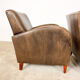 Set of two vintage leather wagon wheel armchairs Haarle