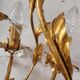 Hand-forged wall lamp gilded with gold leaf and crystals, Italy