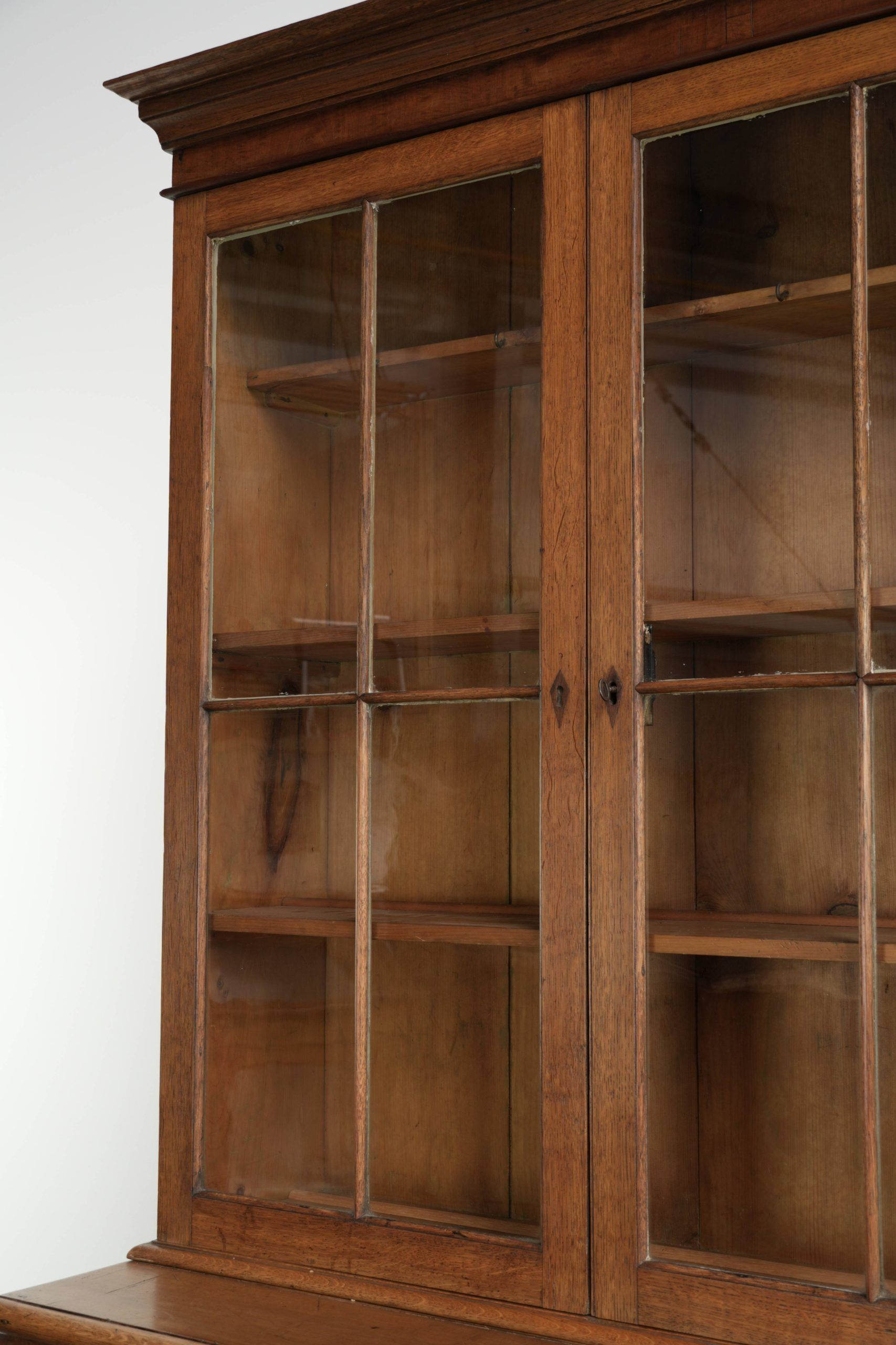 Antique English oak buffet/bookcase from 19th century with original glass