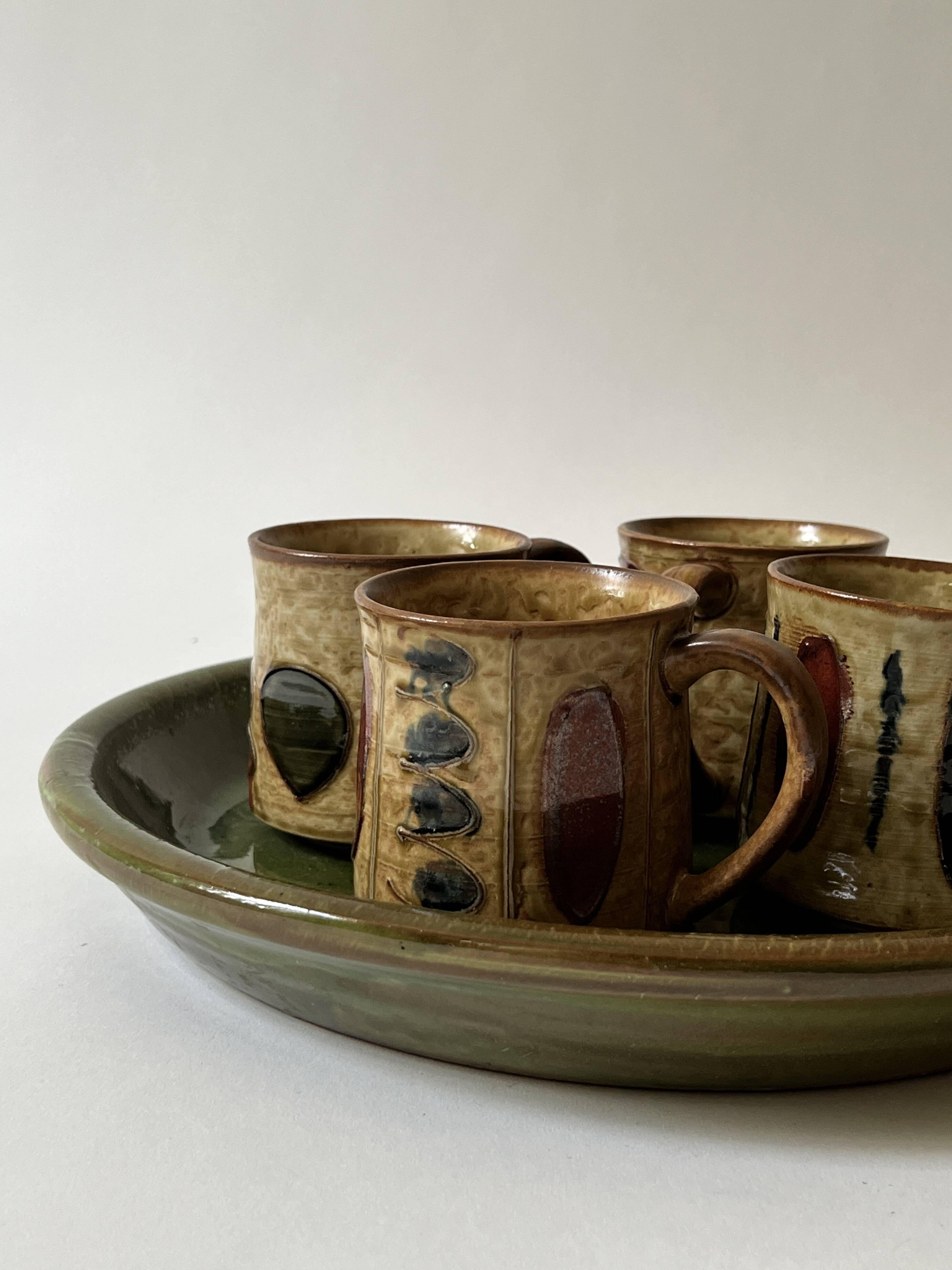 Set of 4 glazed ceramic coffee cups, circa 1970