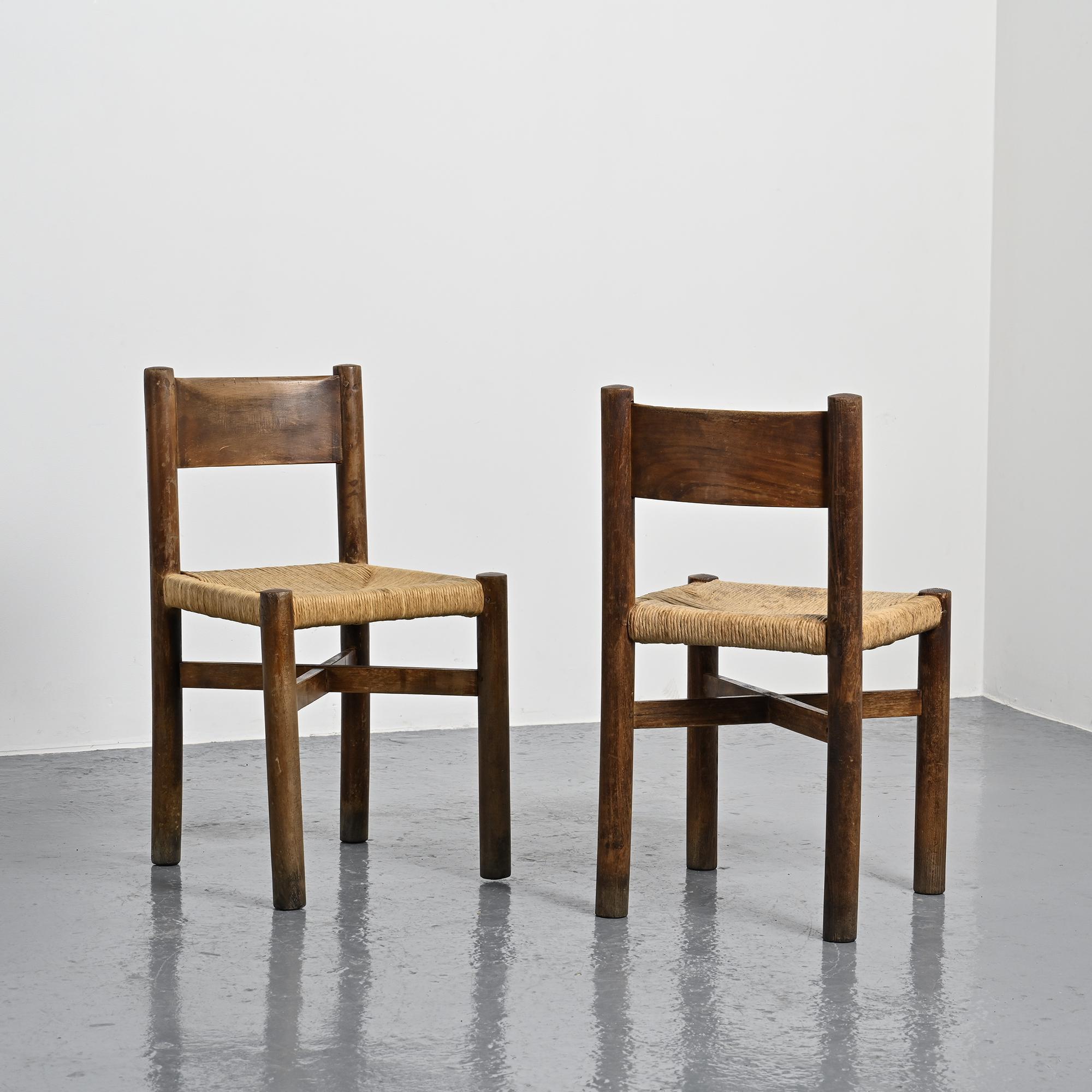 Pair of Méribel chairs by Charlotte Perriand, vintage edition BCB, circa 1950.