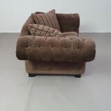 Large weighty love seat with the original matching cushions. Marked "Handmade in Holland"