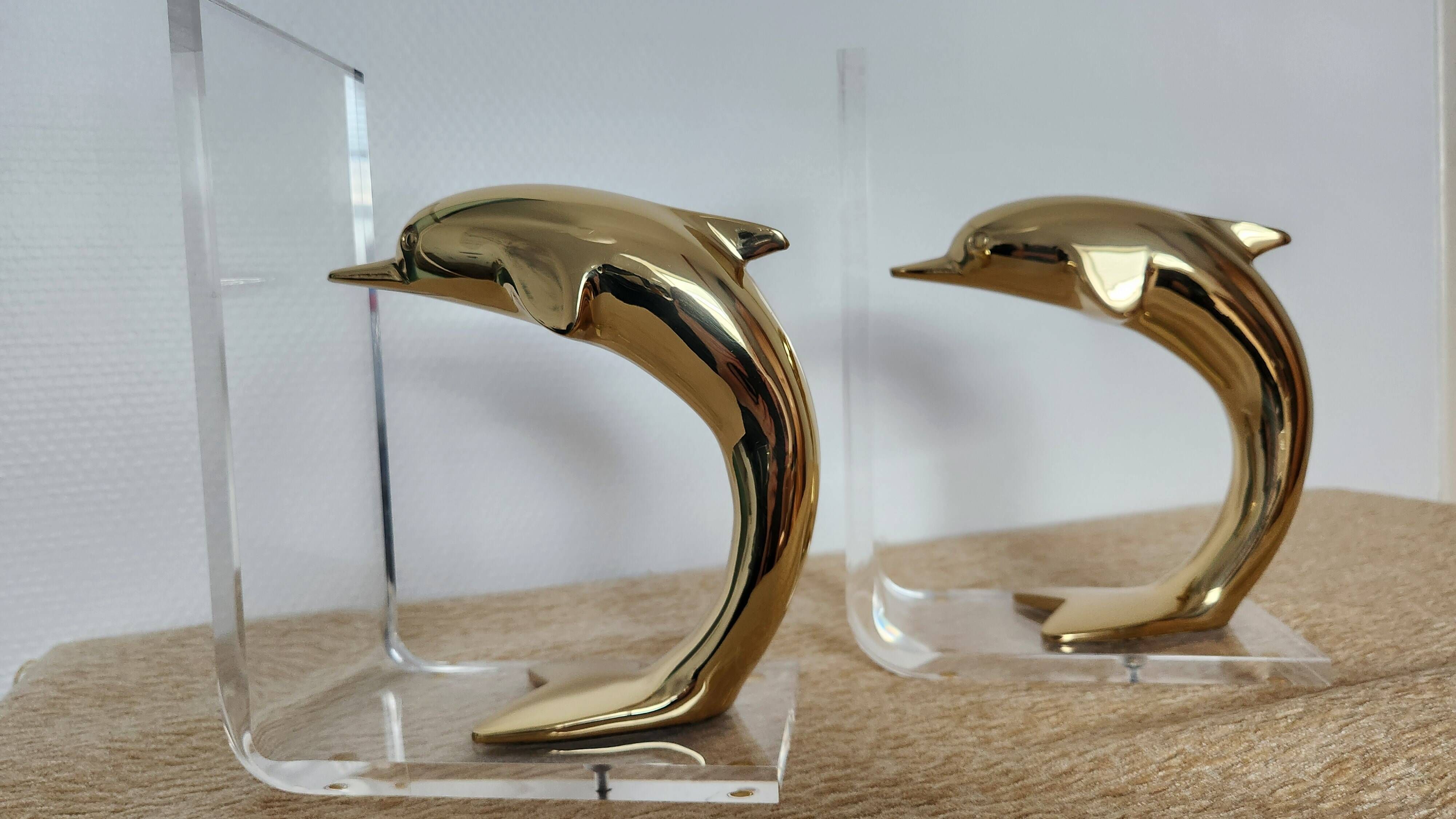 Dolphin bookends in gold metal and plexiglass – 1980s
