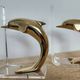 Dolphin bookends in gold metal and plexiglass – 1980s