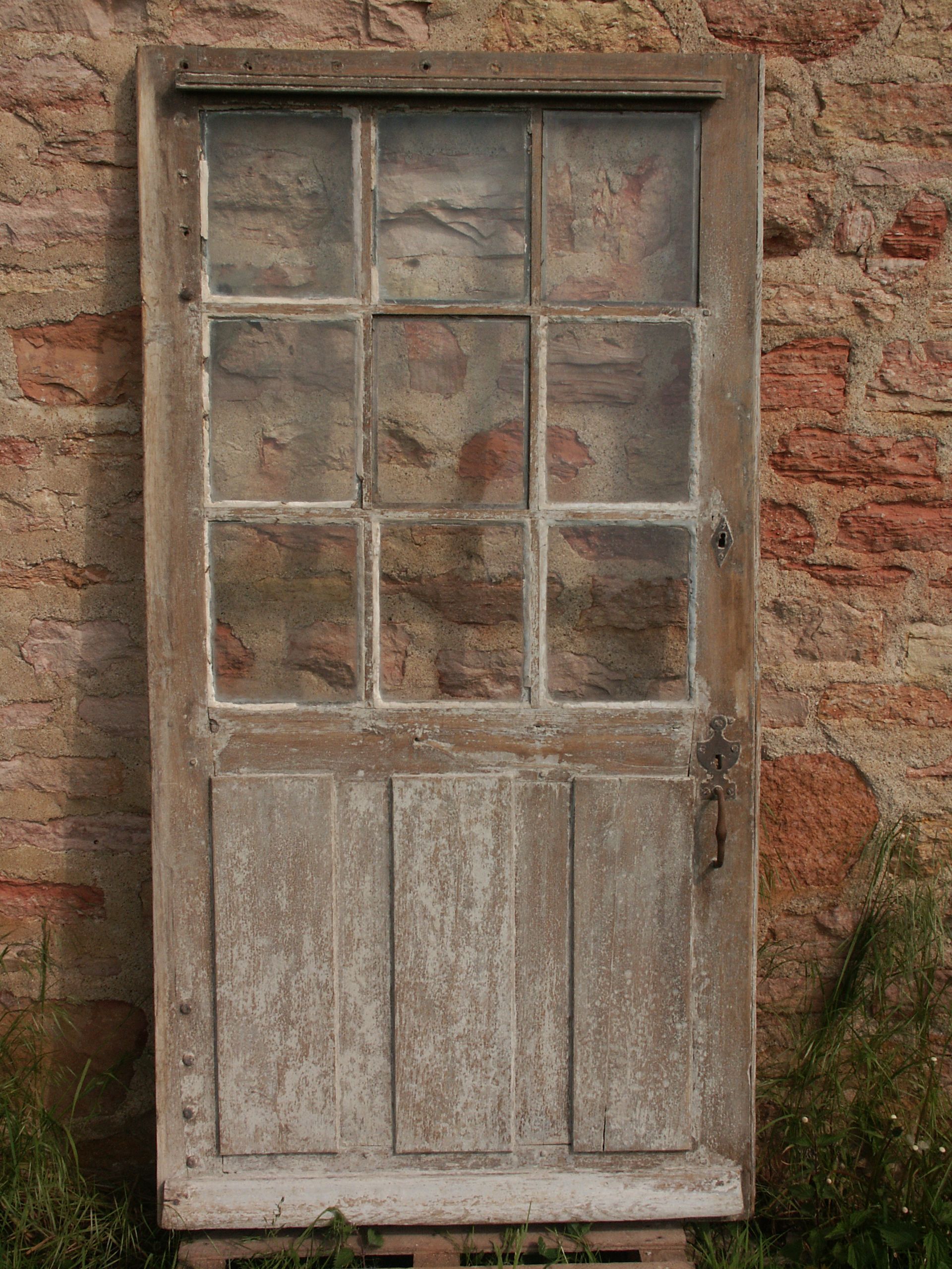 Glass entrance door in solid oak