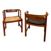 Pair of Ole Wanscher chairs in mahogany, cane and leather.