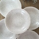 Beige speckled hollow plates