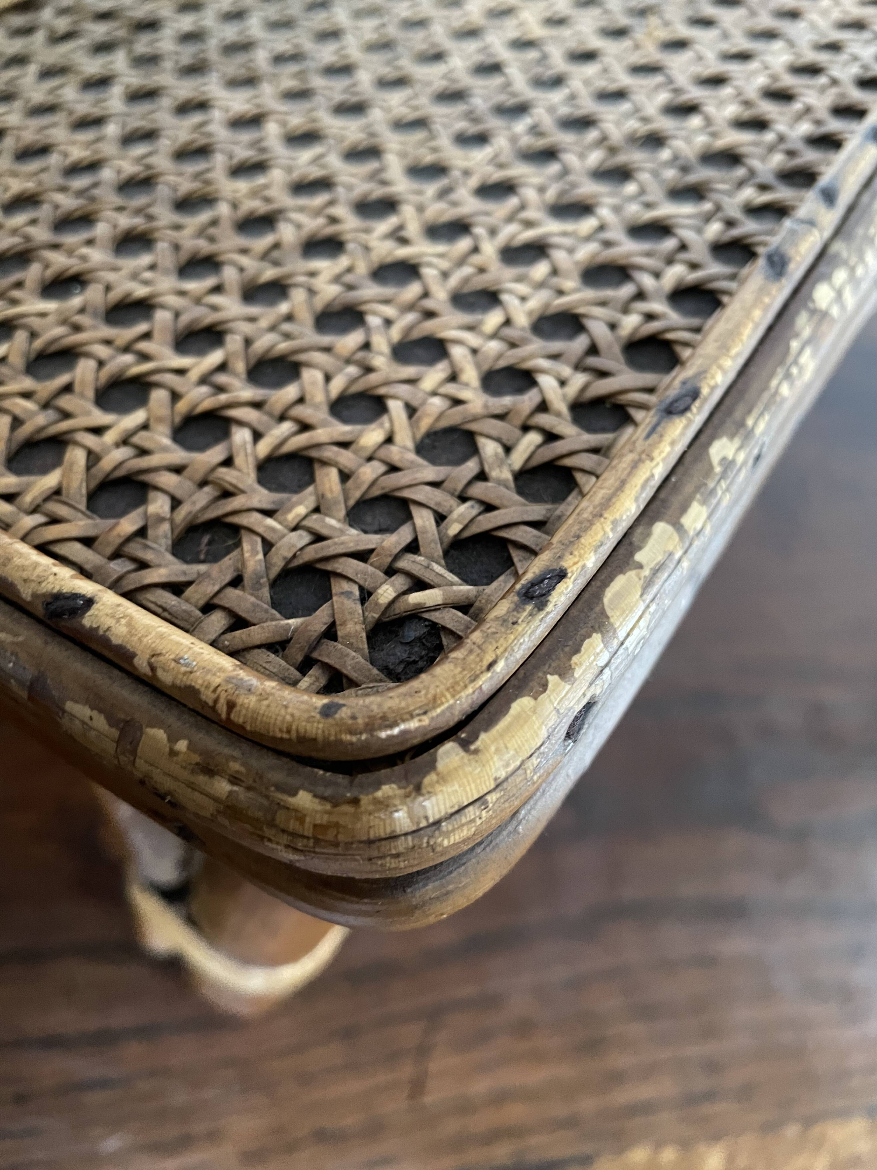 Rattan and cane footrest from the 1950s