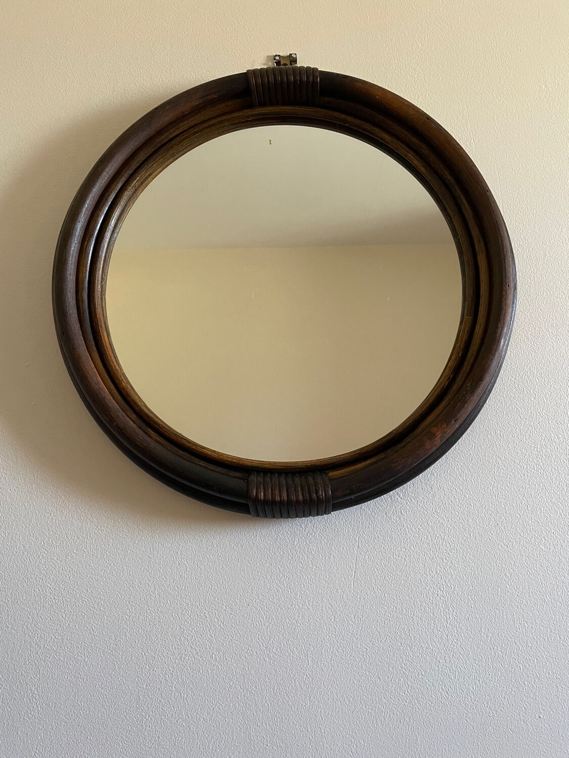 Round rattan mirror