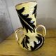 Vase en céramique jaune et noire à décor de feuilles, Vallauris signé JTF numéroté 519