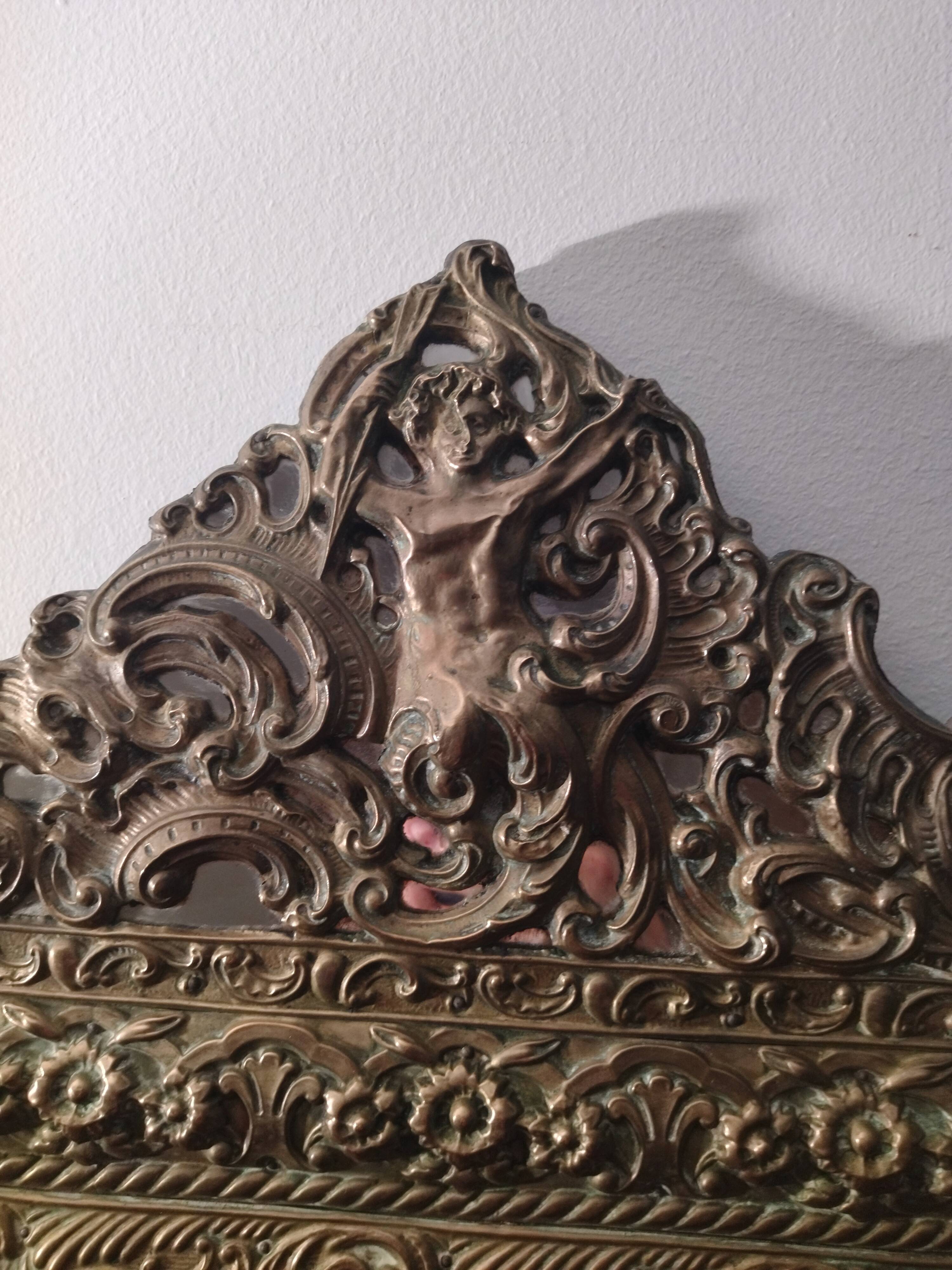 Repelled brass pareclose mirror