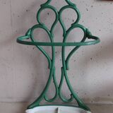 Old green cast iron umbrella stand