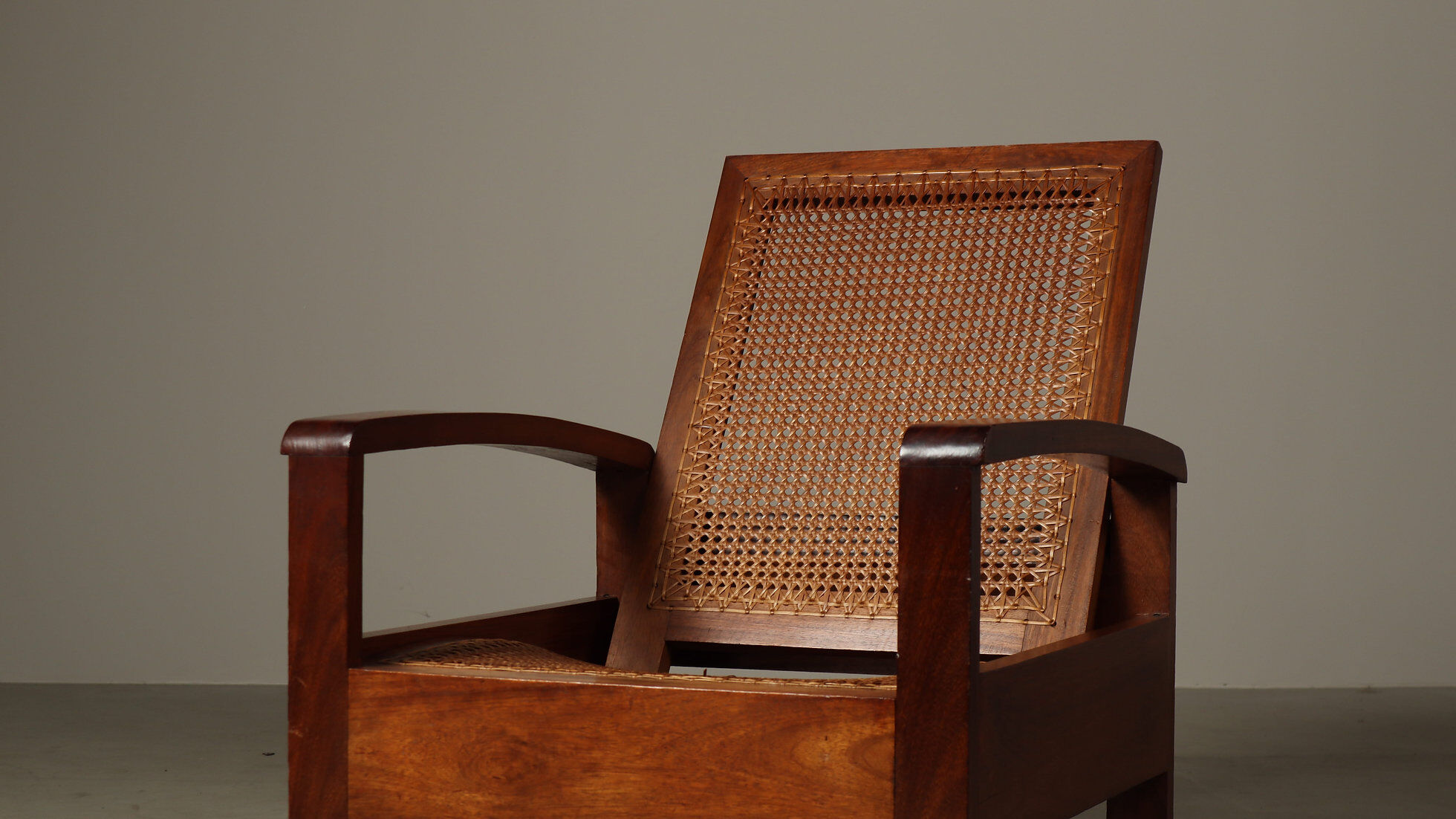 Mid-century architectural teak lounge chair with cane seat, 1950s