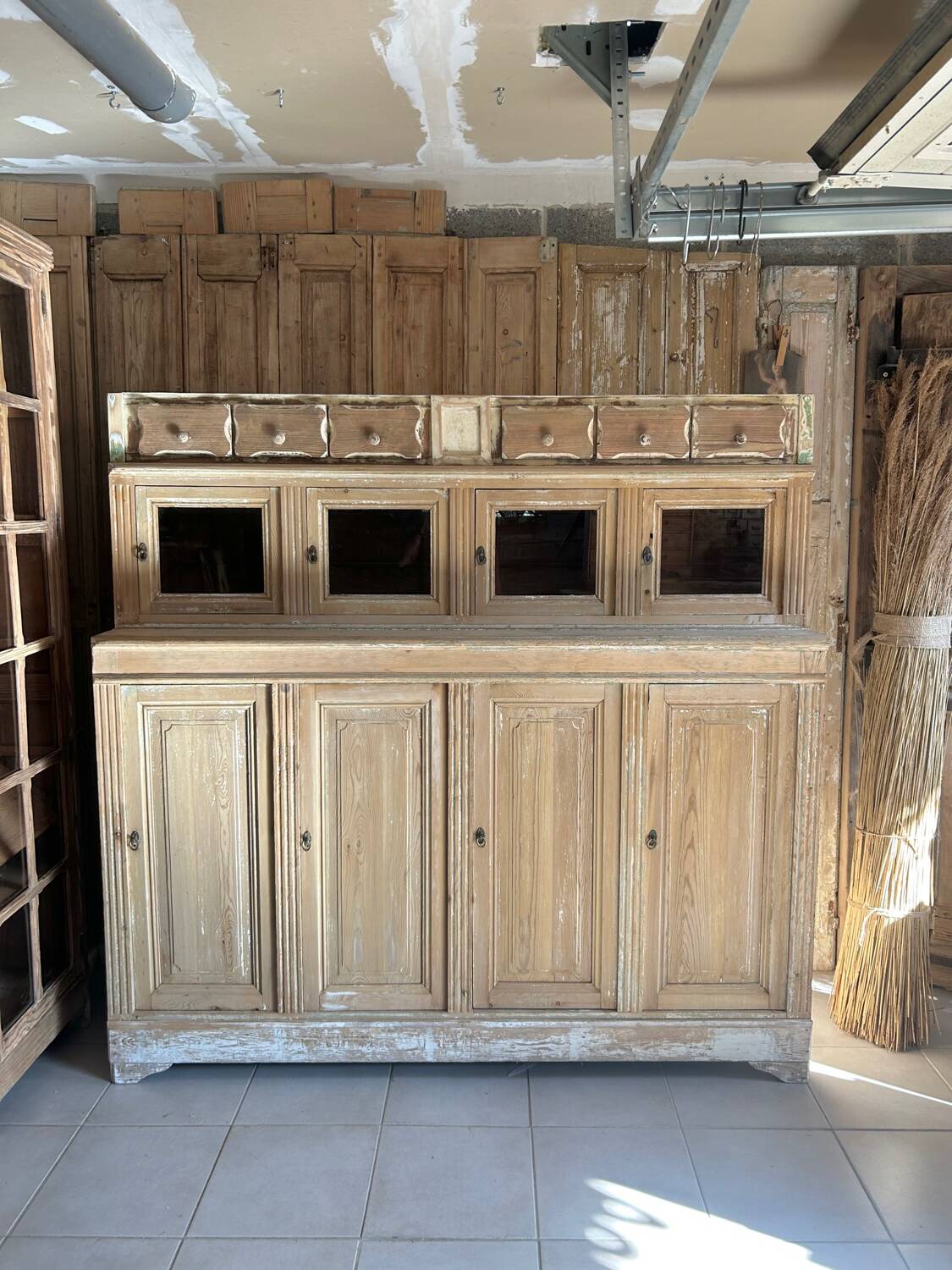 Old wooden grocery store cabinet, display cases and drawers