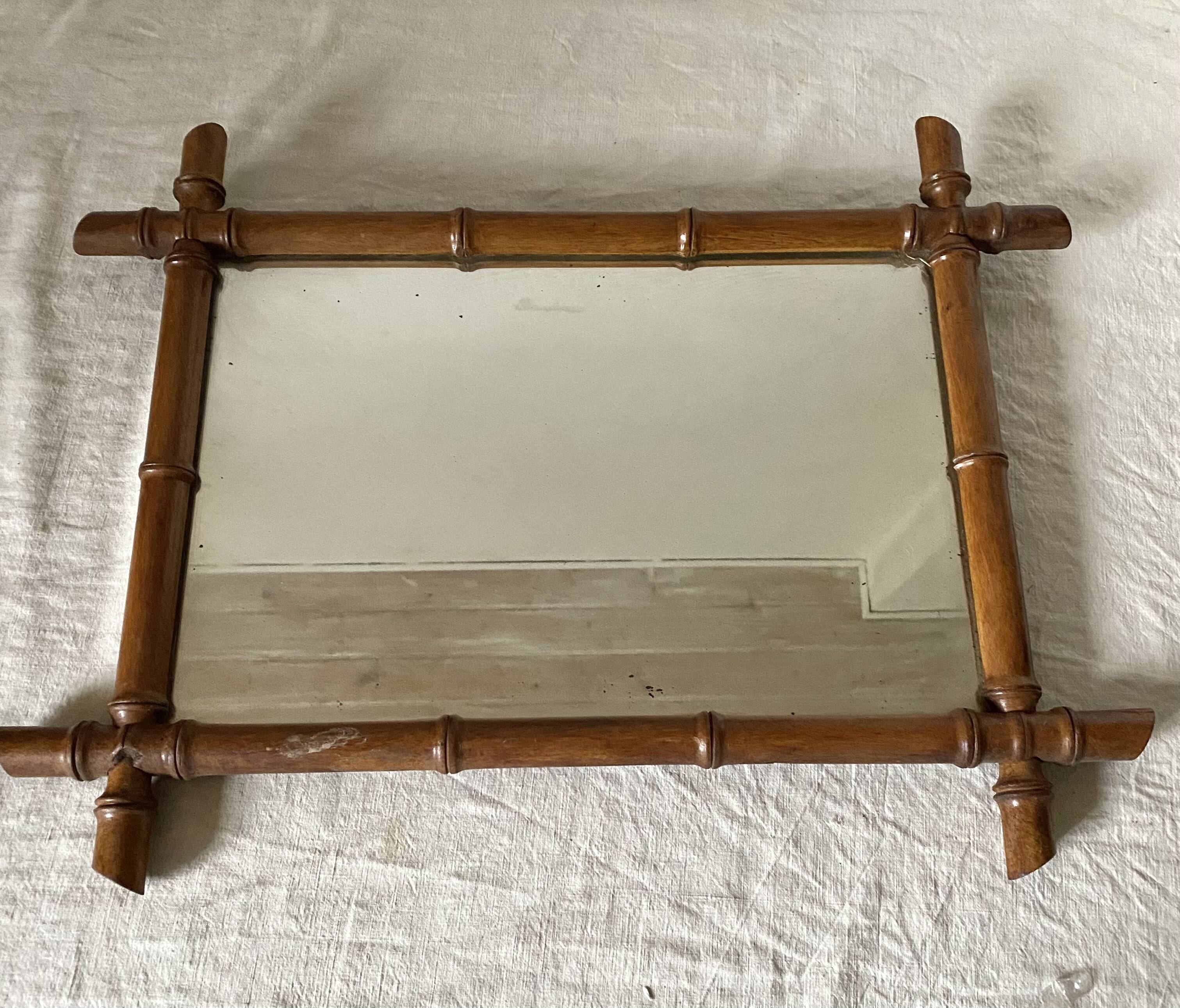 Antique wooden mirror turned bamboo style