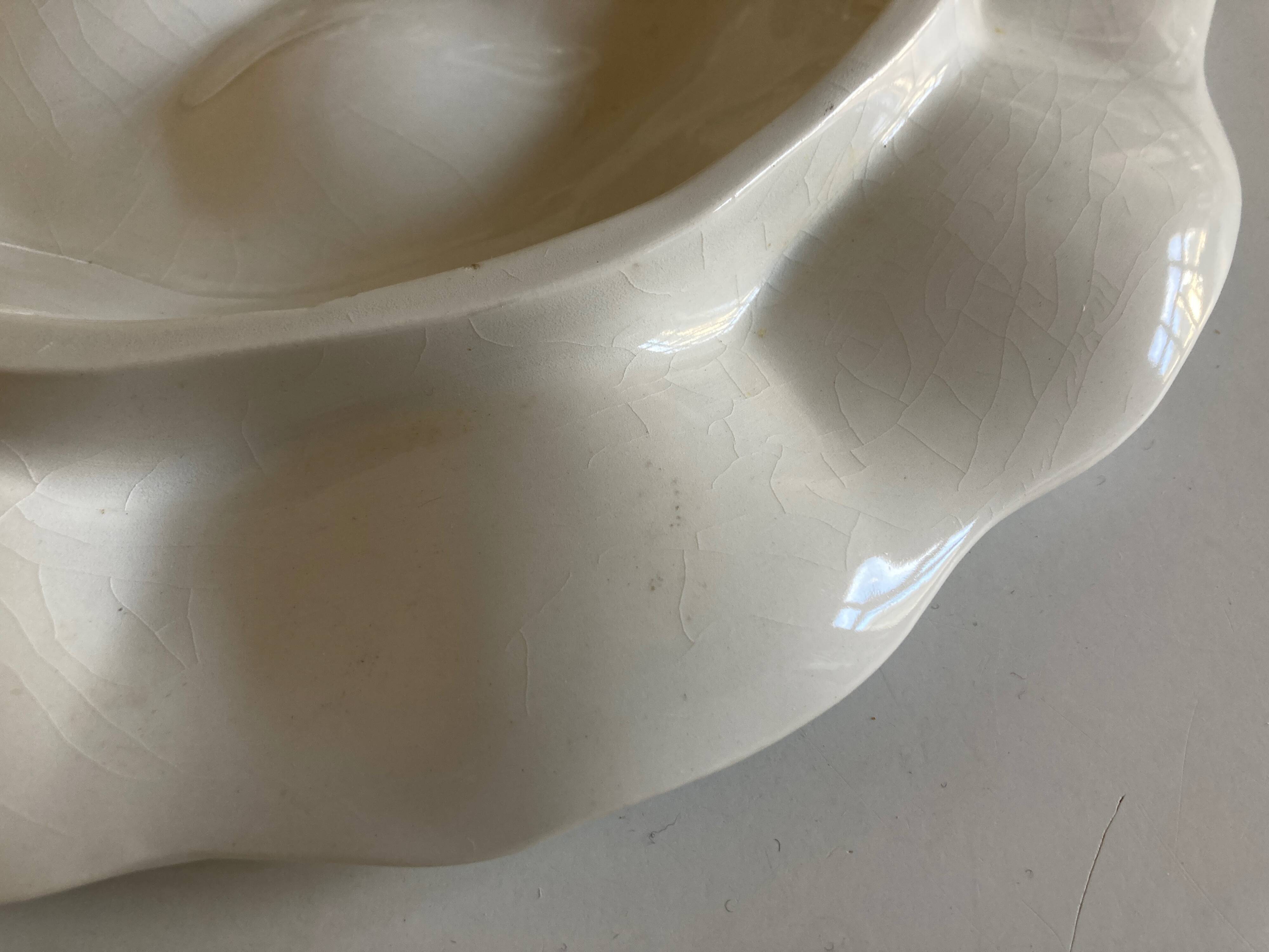Plat en faïence de Gien blanche 1970