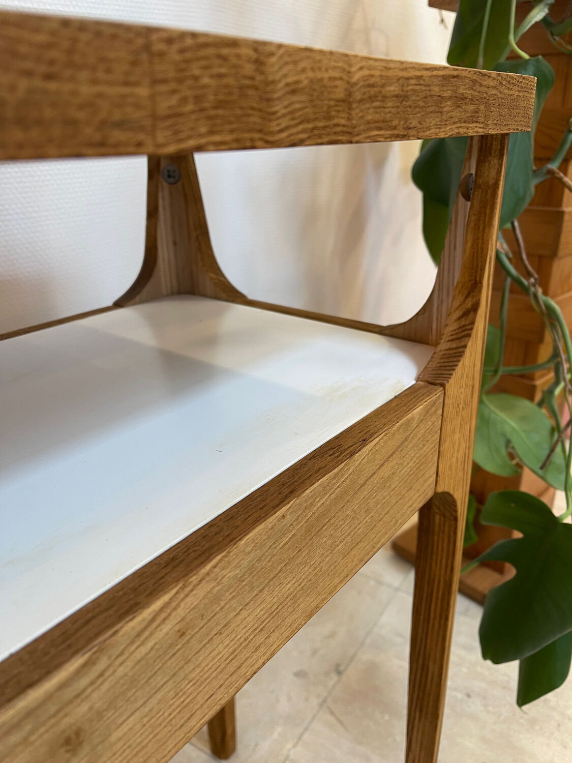 Small contemporary console in stained walnut wood.