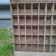 Large piece of professional furniture to hang or place with multiple storage compartments