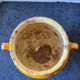 Old yellow glazed terracotta grease pot south west France