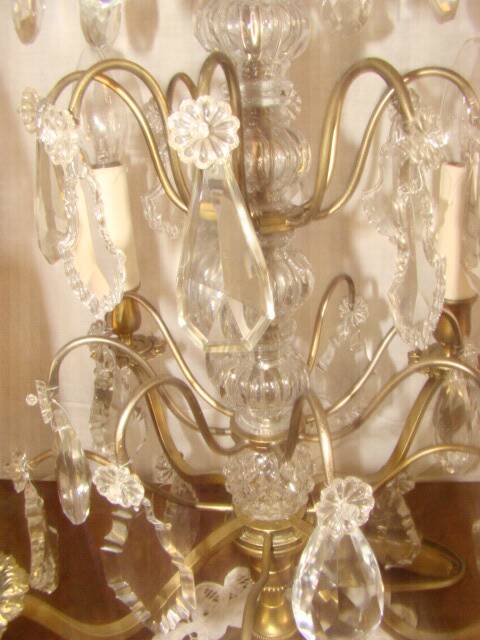 Four-candle girandole in bronze and crystal, early 20th century.
