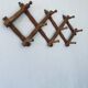 Old wooden wall coat rack
