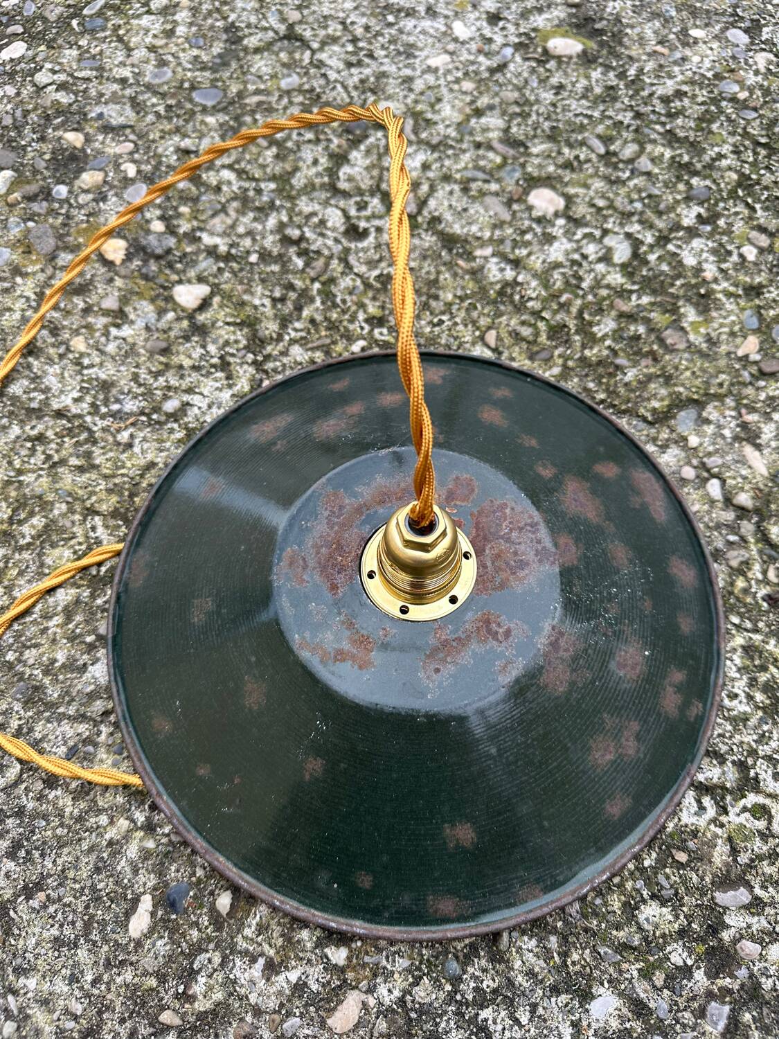 Old industrial black and white vintage enameled sheet metal pendant light