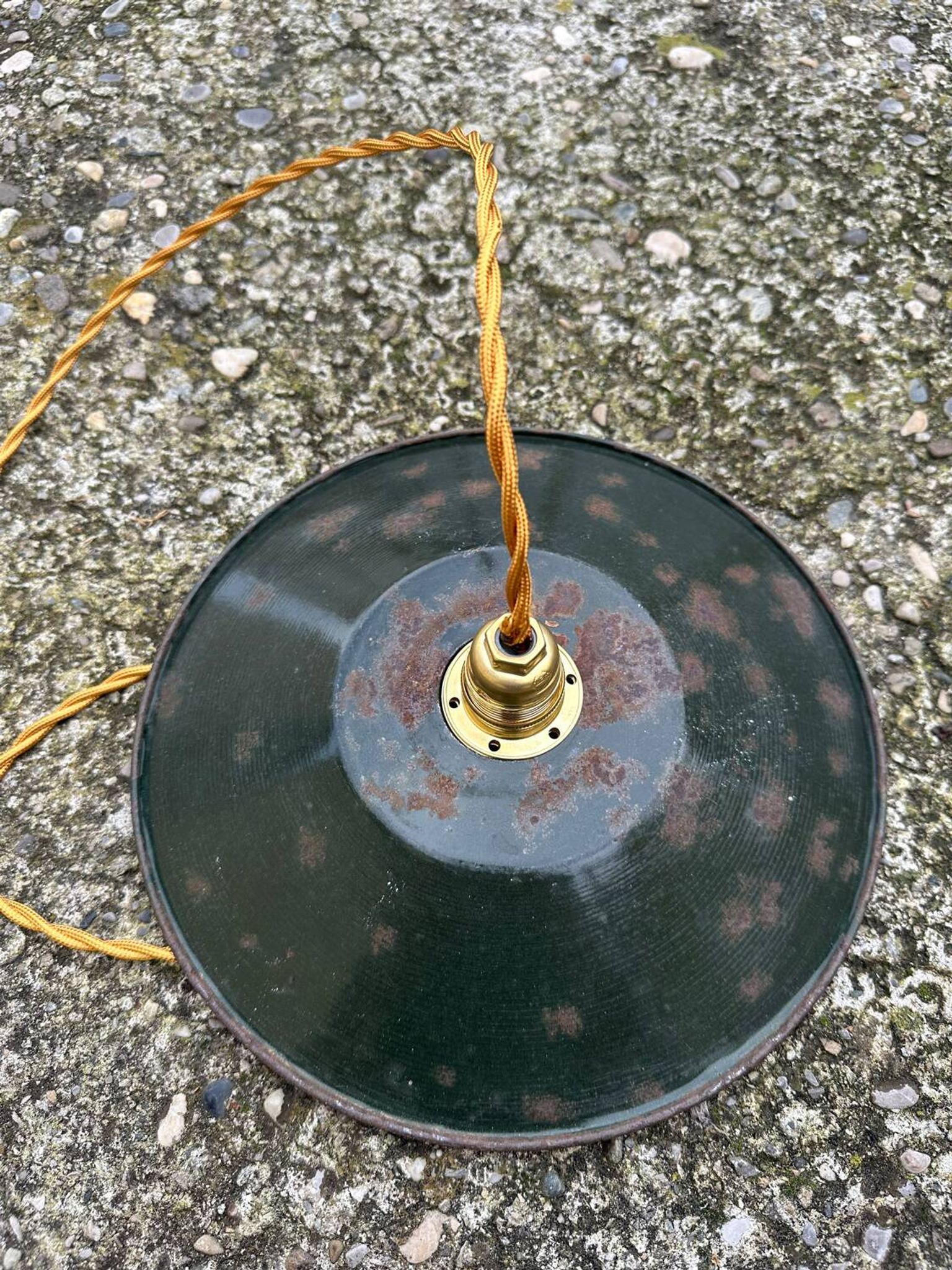 Old industrial black and white vintage enameled sheet metal pendant light