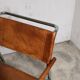 Vintage armchair in cognac leather and chrome tubular steel.