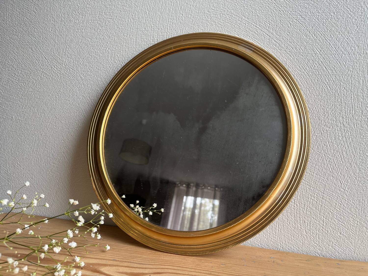 Vintage gold round mirror