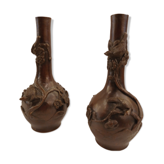 Pair of bronze soliflore vases. Japan, 19th century.