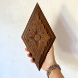 Decorative element, carved wood