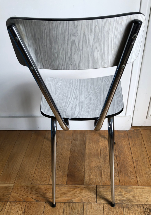 White and grey Formica chairs