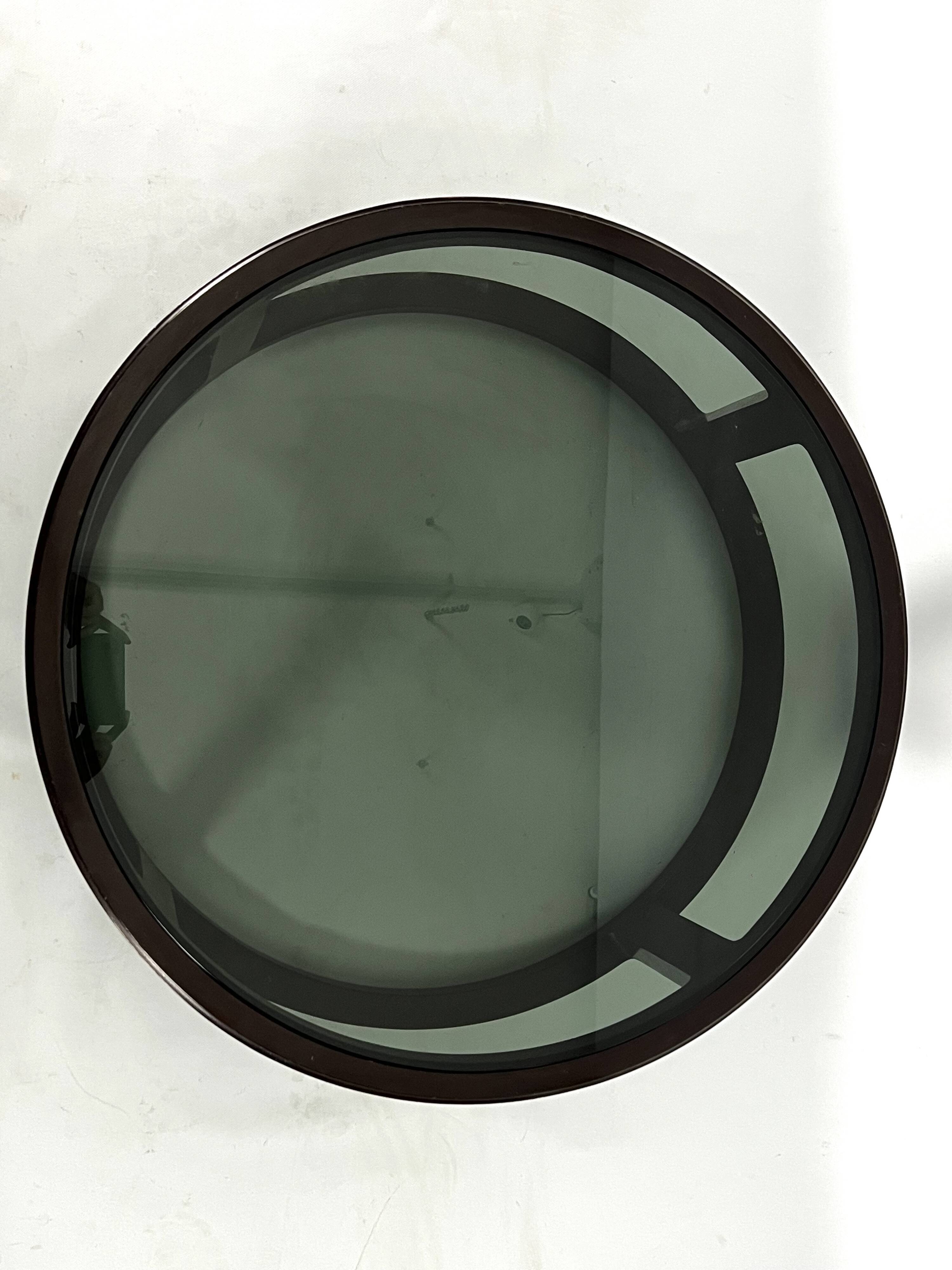 Italian Vintage Large Round coffee table in wood and fume glass. 1970s